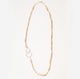 White backdrop with a delicate, 14k gold filled cable chain necklace.  Links are elongated and flat to pick up on extra sparkle.  Handmade sterling silver hook clasp is enlarged relative to the links for contrast and ease of use. 