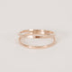 Double band handcrafted gold vermeil ring by Krista Knickerbocker Designs on a white background.  Ring has one smooth and one hammered shiny gold band connected at the back.